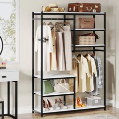 an organized closet with shoes, handbags and purses on the shelves in front of a window