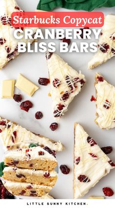 cranberry bliss bars with white chocolate and cranberries on top, surrounded by other desserts