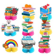 several stickers with books and rainbows on them