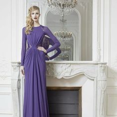 Step Into Elegance With This Zuhair Murad Gown. Made In Italy, Its Violet Purple Hue, Long Sleeves, And Fully-Lined, Full-Length Silhouette Exude Sophistication. Embroidered And Beaded Throughout, It's A Masterpiece Of Craftsmanship. Please See My Other Listings For More Rare Luxury Finds. Size 8 Usa, 40 France, 12 Uk, 44 Italy Measurements: Bust- 35'’ Waist- 28” Hips- 40” Length- 66” From Shoulder To Hem In The Front, 75 At Back. Fabric: 65% Acetate, 35% Nylon Made In Italy About Zuhair Murad: Luxury Maxi Gown With Sweep Train, Luxury Maxi Length Gown With Sweep Train, Pre-draped Long Sleeve Wedding Gown, Elegant Purple Evening Dress For Gala, Elegant Purple Floor-length Evening Dress, Elegant Purple Floor-length Dresses, Elegant Purple Evening Gown, Elegant Floor-length Purple Dresses, Elegant Purple Gown For Evening