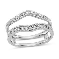 Update her solitaire with this pleasing diamond enhancer. Crafted in 14K white gold, this look features diamonds graduating in size from largest at the center to smallest at the ends on each side of the double-row design. Rope-textured ribbons highlight the contours. Captivating with 3/8 ct. t.w. of diamonds and a bright polished shine, this enhancer is a great complement to her unique style. Solitaire Enhancer, Diamond Enhancer, Peoples Jewellers, Solitaire Ring, Diamond Bracelet, Round Diamonds, The Row, Unique Style, Diamonds