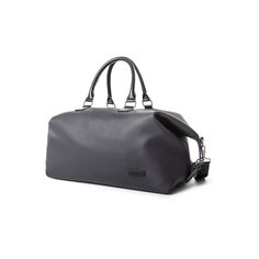 Keep your travel essentials in this stylish duffle bag from Bugatti. SETUP INFORMATION ImportedLUGGAGE FEATURES Multiple inner pockets with multi-use built-in organizer Adjustable, removable strap Reinforced handle Zipper closureLUGGAGE DETAILS Dimensions: 12"H x 19.5"W x 9"D Weight: 5 lbs. Vegan leather Lining: polyester Imported 2-year warranty Model no. DUF2160BU-NAVY,DUF2160BU-GREY WARNING: This product can expose you to chemicals, including lead, which are known to the State of California t Versatile Travel Duffle Bag With Removable Pouch, Versatile Weekender Bag With Adjustable Strap For Overnight Trips, Versatile Satchel Travel Bag For Weekend Trips, Modern Bags With Adjustable Strap For Overnight Trips, Duffle Bag With Removable Pouch For Weekend Trips, Weekend Duffle Bag With Removable Pouch And Double Handle, Functional Duffle Bag With Removable Pouch And Double Handle, Rectangular Luggage With Detachable Strap For Weekend Trips, Modern Satchel Travel Bag For Weekend Trips