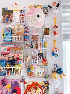 there are many items on the wall in this room, including toys and other things