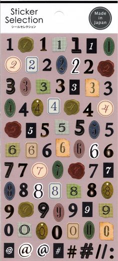 a sticker sheet with numbers and symbols on the front, in various shapes and sizes