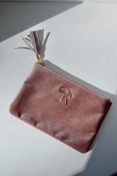 This limited edition pink velvet zippered pouch is a perfect gift, makeup bag, or even an evening clutch. 8.25" in length, 5.5" in height. $20.00 Pink Clutch Pouch With Dust Bag, Evening Clutch Cosmetic Bag With Zipper, Party Cosmetic Zipper Pouch Bag, Pink Zipper Pouch Clutch As Gift, Pink Clutch With Zipper Pouch For Gift, Pink Clutch With Zipper Pouch As Gift, Pink Clutch Cosmetic Bag With Zipper, Elegant Pink Pouch Cosmetic Bag, Ginger Oil