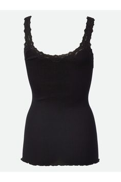 A timeless, year round essential for every woman's wardrobe is the Babette Silk Tank Top. It's feminine style features lace around the neckline and a curly hemline. The soft silk blend is comfortable for all seasons. Wear it alone or under a blouse, sweater or blazer. Imported from Denmark Made of 70% silk and 30% cotton Hand wash Elegant Black Tops With Contrast Lace, Elegant Black Lace Top For Layering, Elegant Black Tops With Scalloped Lace, Fitted Lace Top With Crochet Trim, Elegant Black Top With Scalloped Lace, Elegant Black Scalloped Lace Top, Elegant Lace Top With Crochet Trim, Elegant Scalloped Lace Top For Daywear, Elegant Black Lace Camisole