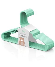 a green plastic hanger with a small bear on it's front and back