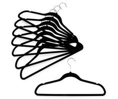 a set of black hangers on a white background