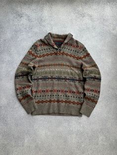 Tommy Hilfiger Aztec Style Lambswool Vintage Sweater Size M (advise to check the measurements, as the sizes sometimes differ).  Gently used 9/10 Chest -53 cm Length - 72 cm Shoulders - 46 cm Sleeve length -68 cm   Please check all Photos , also i can make detailed photos.  Open to offers. New drop every day. Worldwide shipping with tracking number. Every package mark as a "cheap gift", don't worry about taxes) Classic Jacquard Knit Outerwear For Fall, Wool Sweater With Shawl Collar For Cold Weather, Casual Wool Sweater With Shawl Collar, Fitted Wool Sweater With Shawl Collar, Fitted Wool Outerwear With Jacquard Knit, Fitted Wool Jacquard Knit Outerwear, Brown Wool Jacquard Knit Outerwear, Fitted Wool Sweater With Jacquard Knit, Fitted Wool Jacquard Knit Sweater