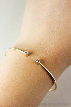 "Minimalist and dainty in style, this dual birthstone bangle is customizable, allowing you to choose 2 birthstones of your choice. You may choose your own birthstone for both options, or you can personalize it to make this birthstone bangle a meaningful gift for: * Moms * Mom-to-bes * Sisters * For her * Bestfriends PLEASE NOTE TO US IN THE NOTE TO SELLER SECTION WHICH 2 BIRTHSTONES YOU PREFER. We can not complete your order without your choice of birthstones. ❥ Stone and Measurements: Genuine A Minimalist Birthstone Bangle Jewelry, Minimalist Birthstone Bangle Bracelet, Custom Birthstone Ring, Bangle Bracelet Gold, Jewerly Set, Moms Bracelet, Writing Gifts, Gold Bangle Bracelet, Bracelet Gold