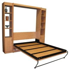 the bed frame is made up and ready to be used as a storage unit for books