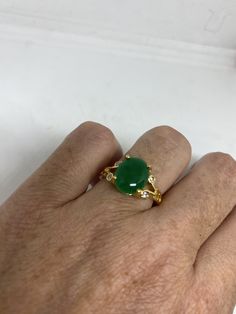 Vintage Lucky Green Nephrite Jade ring Fun jade is color enhanced Large green nephrite jade Ornate German Gold finished Vintage ring, does not tarnish, NOT sterling Size 5.5, 7, 7.5, or 8.75 All rings are shipped free in the US in a nice gift box. Check out our over a THOUSAND great reviews Engraving is $4 per letter and is not always perfect depending on the piece. It can take a few days if the jeweler is busy. This is payable to Paypal Judithsltd@gmail.com Green Crystal Gemstone Ring, Green Gemstone Crystal Ring, Green Emerald Oval Cabochon Ring, Green Emerald Ring With Oval Cabochon, Jade Rings Oval Cabochon For Anniversary, Green Gemstone Crystal Open Ring, Green Jade Jewelry For Anniversary, Green Jade Anniversary Rings, Jade Ring For Anniversary, May Birthstone