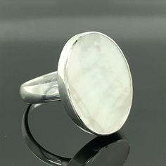 Silver Mother of Pearl Ring , Pearl Ring ,Mother of Pearl Boho Chic Sterling Silver Ring , Natural Gemstone , 15x20mm , Elegant Oval Ring , 925k Sterling Silver Ring , Gift For Her ★Item Details * Material : 925K Sterling Silver * Total weight :6 Gram * Gemstone : Mother of Pearl * Stone Diameter : 15x20mm ✔ Ready to Ship in 1-2 Business Days .. ✔ Shipped to the Worldwide 1-5 business days with free shipping... ✔ The product will be sent to you with a handmade wooden box to avoid any damage duri White Sterling Silver Oval Signet Ring, White Oval Ring With Large Stone, White Oval Moonstone Ring With Large Stone, Large Oval White Moonstone Ring, Classic White Oval Moonstone Ring, White Oval Gemstone Signet Ring, Large Oval Moonstone Ring, White Oval Opal Ring With Polished Finish, White Oval Signet Ring For Anniversary