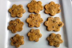 a white plate topped with cookies on top of a table