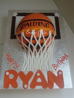 a birthday cake made to look like a basketball