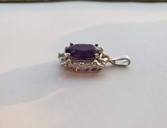 ♥ Product Summary ♥Main Stone: Amethyst Total Carat Weight: 7.77cttwMetal Choice: 14K Solid White GoldStone Cut: OvalDimensions: 23mm x 18mm (.91 inch by .71 inch) Size of Stone: 16mm**Pendant only Oval Purple Diamond Cut Jewelry, Purple Oval Diamond Cut Jewelry, Formal Purple Necklace With Polished Finish, Classic Amethyst Oval Pendant Jewelry, Purple Oval Sterling Silver Gemstones, Ruby Diamond Rings, Symbolic Jewelry, Gift For Her Birthday, Necklace Wedding