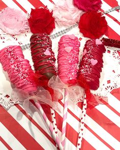 valentine's day candy lollipops with pink and red roses