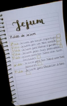 an open notebook with writing on it and the words jejum written in spanish