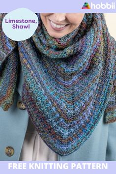 a woman wearing a multicolored knitted shawl with the text free knitting pattern