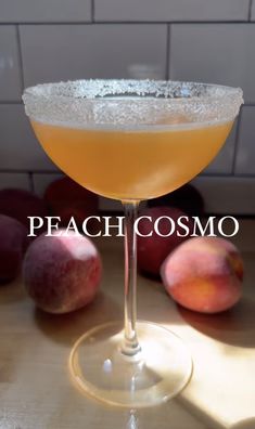 the peach cosmoo cocktail is ready to be served