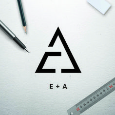 the letters e and a are surrounded by pencils