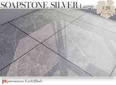 an advertisement for soapstones silver large marble flooring tiles, with the words soapstones silver large on it