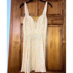 Reformation Dress In Great Condition. No Visible Wear Or Flaws. No Stains. Zipper Works. Mini Dress Silk Outer With Reinforced Structured Sweetheart Neckline. Yellow Floral Design. Extra Lining On Bodice. Straps Are Not Adjustable But Back Zipper Enclosure Has Ruching For Extra Stretch Around Chest Area. I Couldn’t Find A Photo Or Name For The Original Style But Attached A Similar Dress From The Reformation Website To Show The Fit. This Dress Is Fitted In The Bodice With A Slight Flair On The Skirt. Perfect Choice For Summer! Princess Polly Yellow Floral Dress, Yellow Floral Print Mini Dress, Reformation Floral Mini Dress, Yellow A-line Cotton Mini Dress, Yellow Floral Print V-neck Sundress, Reformation Dress, Yellow Floral, Sweetheart Neckline, Yellow White