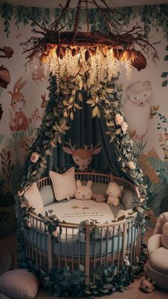 a baby crib with stuffed animals and greenery on the walls, hanging from a chandelier