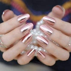 [Size]Rose pink metallic press on nails short length are 24pcs/set, there are 10 sizes to choose, please pick the suitable one to fit your natural nail bed. [Thickness]Short oval round press on nails are normal thickness, can stay on good shape when worn. [Safe Material]Solid color pink artificial nails made of healthy ABS, safe, light weight and breathable, comfy to wear. [Apply and remove]Due to the shipping issue, short length metallic press on nails with designs come with adhesive tabs, some buyers complain that they are easy to pop off, in fact they will last for long time when you apply the sticker correctly, if dislike the glue tape, please prepare the liquid glue instead. We don't recommend you to kind of just peel them off, this way will hurt your nail bed, you can soak your hands Smooth Nails, Chrome Effect, Rose Gold Nails, Simple Look, Nail Powder, Glitter Nail, Nail Art Hacks