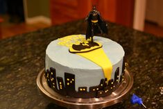 Batman birthday cake with edible fondant Gotham Skyscrapers and Batman logo