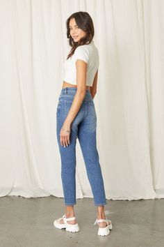 Nora Button Fly Jeans feature a high rise mom fit with a button fly, regular hem, and comfort stretch for long-lasting, all-day comfort. Enjoy the perfect fit with a denim that moves with you. Our most popular jean! Everyday Light Wash Mom Fit Bottoms, Medium Wash Mid-rise Mom Fit Bottoms, Mid-rise Mom Fit Bottoms In Medium Wash, Casual High Rise Mom Fit Cropped Jeans, Everyday Mom Fit Cropped Bottoms, High-waist Medium Wash Cropped Jeans, Everyday Mid-rise Cropped Jeans, High Rise Mom Fit Cropped Jeans, Medium Wash Mom Fit Cropped Bottoms