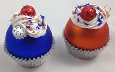 two cupcakes decorated with red, white and blue frosting