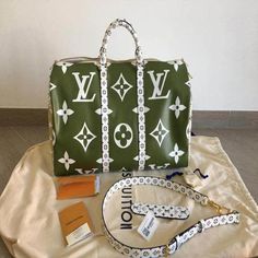 Description For Summer 2019, Louis Vuitton reinvents the Keepall Bandoulière 50 bag in a new bold colorway featuring khaki green Monogram canvas on one side and beige on the other. The XL version of the iconic Monogram pattern gives this bag a strikingly graphic look. First introduced in the 1930s, the Keepall is Louis Vuitton’s original soft travel bag. Size: 19.7 x 11.4 x 8.7 inches / 50.0 x 29.0 x 23.0 cm Cabin size Khaki Green / Beige Monogram coated canvas Cowhide-leather trim Gold-color hardware Double zip closure with padlock Adjustable and removable shoulder strap Leather strap with metallic buckle for the handles Removable leather name tag Internal zipped pocket Large capacity Comes with dust bag, ation cards, and pamphlets 1:1 mirror image qualityDelivery 5-8 or 10-15 working day Louis Vuitton Travel, Leather Travel Bag, Monogram Pattern, Louis Vuitton Keepall, Green Beige, Handbag Wallet, Wallet Accessories, Summer 2019, Louis Vuitton Twist Bag