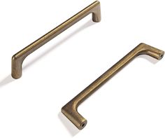 two antique brass handles on a white background with clippings to the left and right