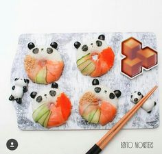 there are some sushi with panda bears on it