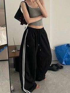 Dodobye White Stripe Joggers Women Y2k Vintage Loose Embroidery High Waist Kpop Wide Leg Sports Pants Hip Hop Casual SweatpantsSPECIFICATIONSBrand Name: DodobyeStyle: Y2KAge: JUNIOROrigin: Mainland US(Origin)CN: ZhejiangSeason: All seasonWaist Type: highDecoration: embroideryDecoration: PocketsDecoration: vintageElasticity: Non StrechFabric Type: BroadclothPattern Type: StripedPant Style: Wide leg pantsMaterial: POLYESTERFit Type: LOOSELength: full lengthCraft of Weaving: TATRelease Date: Spring Y2k Wide Leg Cotton Sweatpants, Y2k Style Cotton Sweatpants For Streetwear, High Waist Sporty Joggers For Streetwear, High Waist Cotton Parachute Pants, Sporty High-waist Cotton Parachute Pants, Joggers Women, Crop Top Jacket, Striped Pant, 2 Piece Skirt Set