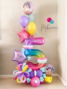 balloons are stacked on top of each other