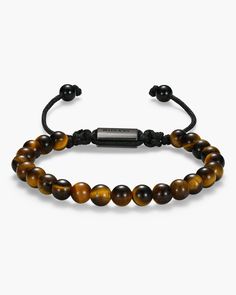 Good vibes only: the bracelet you need to feel good every day is available now. Our men’s Tiger’s Eye Beaded Bracelet has tiger’s eye beads, black details, and an adjustable fit. The earthy tones of this casual bracelet can be styled as an everyday accessory or paired with the matching Beveled Tiger’s Eye Signet ring for an elevated fit. JAXXON Tiger's Eye Beaded Black Bracelet | Size Perfect Fit Adjustable Casual Bracelets, Black Bracelet, Solid Gold Chains, Tiger Eye Beads, Eye Beads, Men's Bracelet, Black Bracelets, Everyday Accessories, Silver Shop