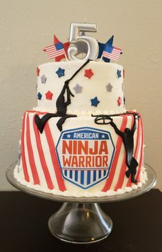 the cake is decorated with an american flag and number five on it's side