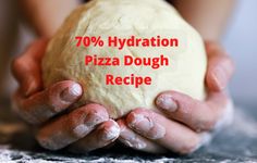 a person holding a ball of dough with the words 70 % hydration pizza dough recipe