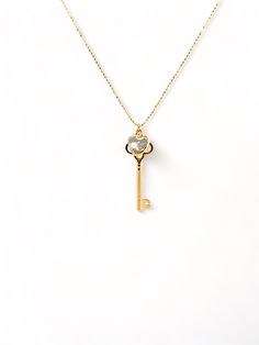 This elegant gold-plated necklace with a key and a beautiful heart-shaped pearl will open anyone's heart. The long chain is crafted with a 1.5” key that unlocks a delicate 1/2” heart, creating an exclusive piece to be treasured for years to come. Invite your loved one to unlock your heart - gift this timeless symbol of love. Cheap Romantic Jewelry Gift With Key Clip, Key Necklace Gold, Key Heart Necklace, Gold Key Necklace, Vintage Gold Key Necklace, Elegant Heart-shaped Key Jewelry, Slouch Socks, Expensive Jewelry Luxury, Key To My Heart