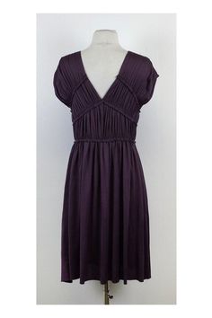 This mauve silk dress features a gathered bust and shoulders that give it a romantic feel. Pair it with gladiator sandals for an effortless look! Size Small Body 100% Silk Slips on Double v neck Gathered bust Shoulder to Hem 38" Bohemian, preppy, hippy, young, & luxe are all words to describe this designer's style. Tory Burch has a signature style but also keeps up with new trends and creates some of her own. Her use of bright colors and bold patterns gives her designs a fresh, modern look. Purple Ruched Bodice Summer Dress, Purple Ruched Bodice Dress For Summer, Summer Purple Dress With Ruched Bodice, Summer Evening Midi Dress In Mauve, Summer Evening Mauve Midi Dress, Purple Pleated Midi Dress For Summer, Gathered Dress, Buy Shoes Online, Silk Slip