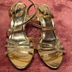 Metallic Gold Rhinestone Bling Strappy 3” Heel Sandal Size 8.5 8 1/2 Brand New These Have Never Been Worn, The Brand Is Silver Slipper, And Are Super Flattering, Especially With A Black Dress With Gold Embellishments. Gold Sandals Medium Width For Evening, Gold Sandals For Evening With Medium Width, Evening Gold Sandals, Silver Slippers, Gold Embellishment, Heel Sandal, Gold Rhinestone, Slipper Shoes, Cancun