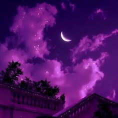 the night sky is filled with purple clouds and stars, as well as a half moon