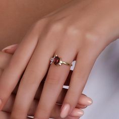 Indulge in the timeless elegance of our 14K gold rings, meticulously crafted to enhance your personal style. Each ring is expertly made from genuine 14K gold, radiating a warm and luxurious glow that will captivate all who lay eyes on it. Our collection boasts an array of stunning designs, ranging from sleek and minimalist to intricate and ornate, ensuring there's a perfect ring to match your unique taste. Whether you're looking for a statement piece to dazzle at special occasions or a delicate band for everyday elegance, we have something to suit every occasion. Crafted with exceptional attention to detail, our 14K gold rings showcase exquisite craftsmanship that stands the test of time. The high-quality gold ensures lasting durability, allowing you to cherish your ring for years to come. Luxury Oval Ruby Ring For Anniversary, Luxury Oval Ruby Ring With Prong Setting, Elegant Birthstone Ring With Prong Setting For Proposal, Classic Birthstone Ring For Proposal, Fine Jewelry Birthstone Ring With Gemstone For Proposal, Formal Cluster Ring With Accent Stones And Open Shape, Formal Cluster Ring With Accent Stones, Timeless Oval Ruby Ring With Diamonds, Fine Jewelry Cluster Ring With Gemstones For Proposal