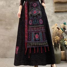 Artistic Floral Stitched Wraparound Maxi Skirt with Embroideries Bohemian Multicolor Skirt With Floral Embroidery, Multicolor Bohemian Skirt With Floral Embroidery, Folk Style Multicolor Embroidered Skirt, Traditional Black Embroidered Skirt, Traditional Embroidered Black Skirt, Traditional Long Skirt With Floral Embroidery, Folk Style Embroidered Multicolor Skirt, Bohemian Long Skirt With Floral Embroidery, Bohemian Multicolor Embroidered Skirt