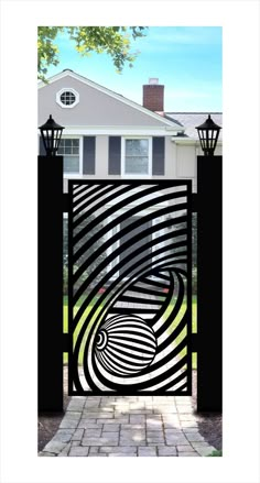 a black and white gate with an abstract design