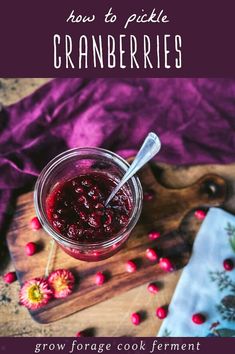 cranberry sauce in a small glass jar with spoon