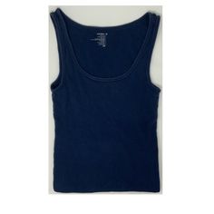 Navy Blue Color Tank That Works Well For Layering Blue Ribbed Scoop Neck Top, Everyday Blue Ribbed Tops, Everyday Blue Ribbed Tank Top, Blue Ribbed Cotton Tank Top, Casual Blue Ribbed Tank Top, Blue Ribbed Crew Neck Tank Top, Blue Everyday Tops With Scoop Neck, Basic Blue Tank Top, Blue Tops With Scoop Neck For Everyday Wear