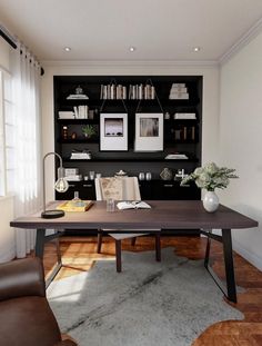 a room with a desk, chair and bookshelf on the wall above it